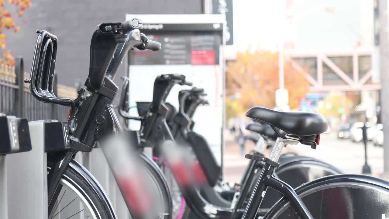 Downtown city bike rental. Rent a bike. Urban economic transportation.