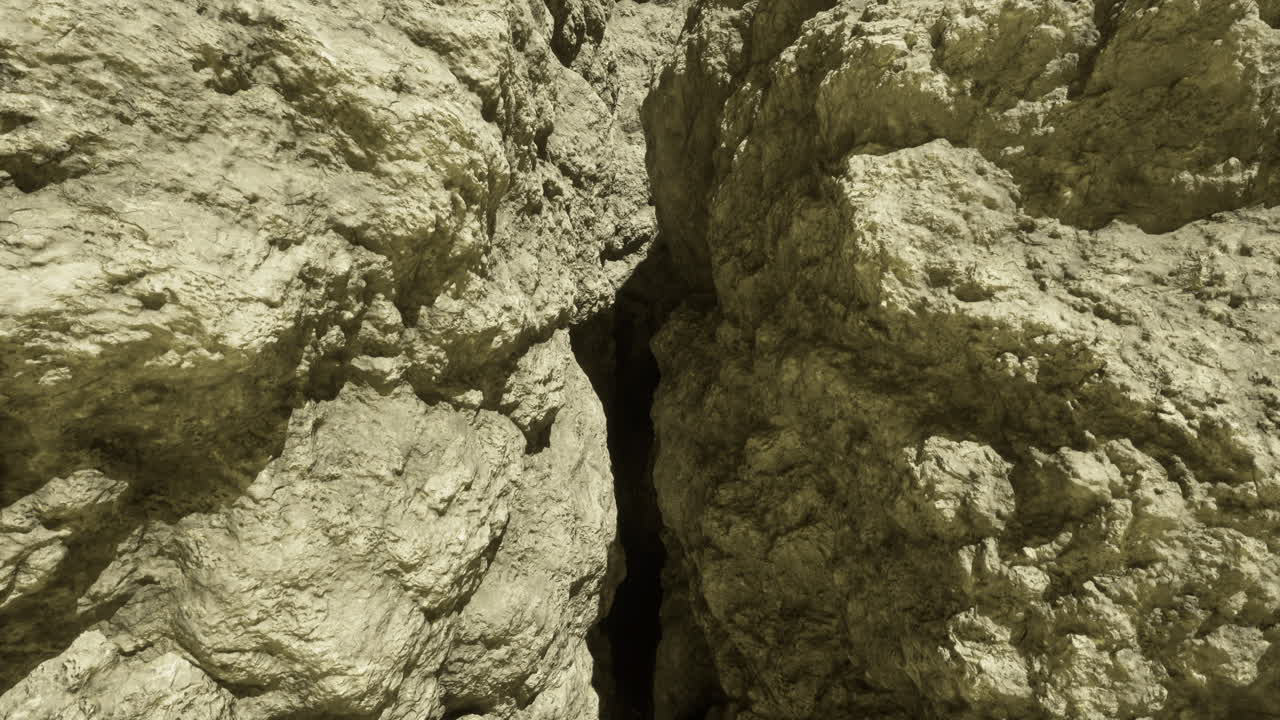 Cracks in rugged terrain show natures artistry in rock