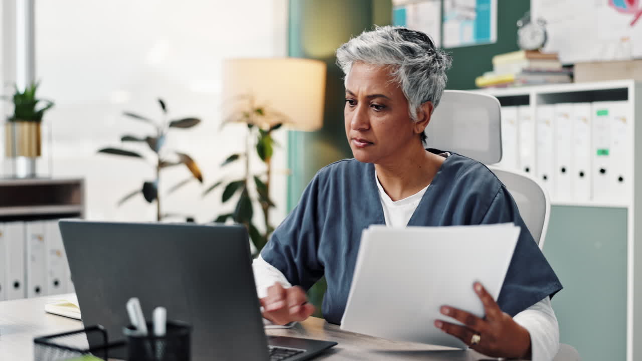 Medical professional working at a desk