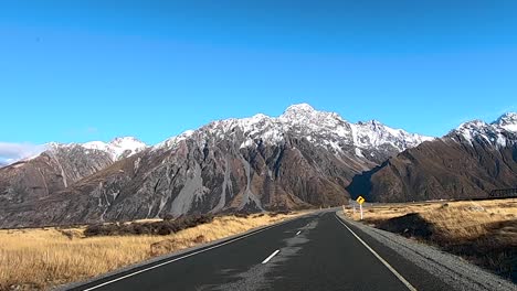 driving through mt cook national park in new zealand around the winter period