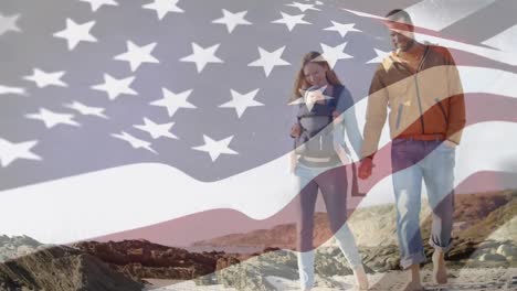 caucasian couple walking with us flag waving foreground