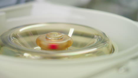 close up of micro centrifuge spinning experiment samples at high centrifugation force in laboratory, 4k