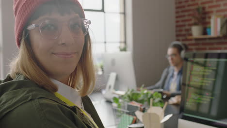 portrait caucasian woman programmer coding network security software for startup company professional web developer smiling enjoying typing code on computer screen in successful office