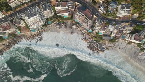 Above-View-Of-Foamy-Sea-Waves-At-Clifton-1st-Beach-In-Cape-Town,-South-Africa