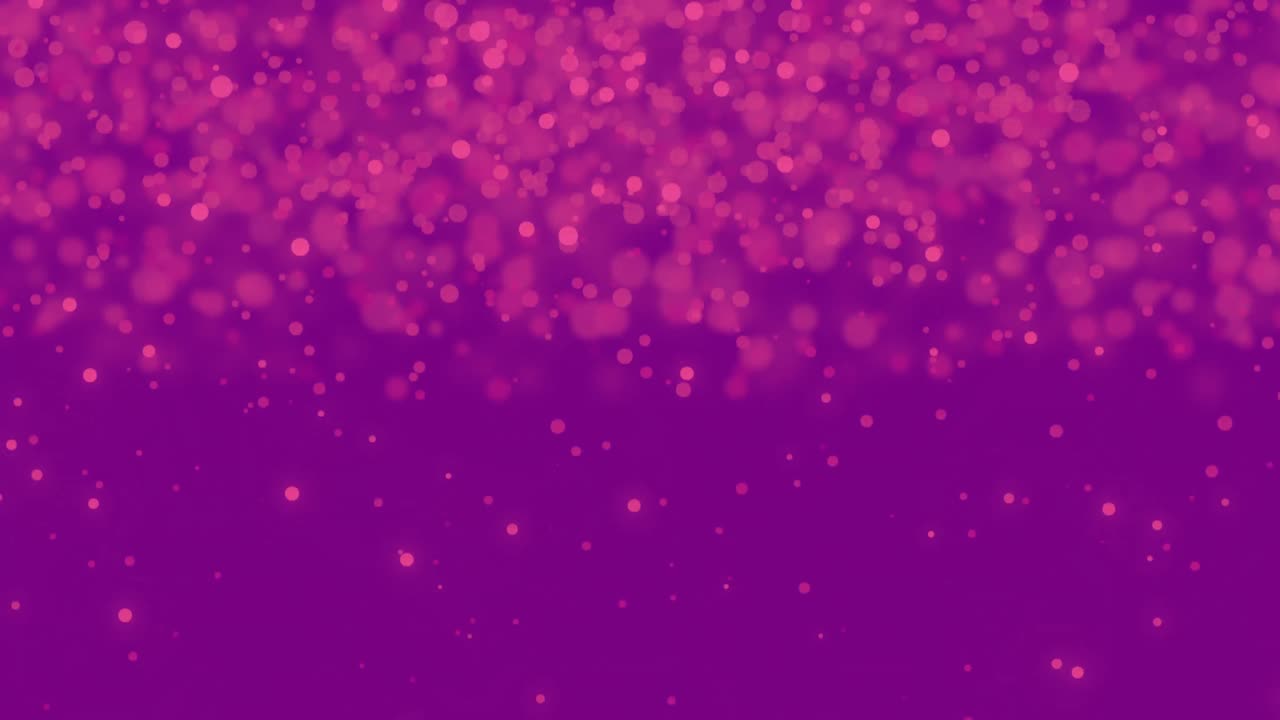 manchas rosadas brillantes que se mueven contra un fondo púrpura