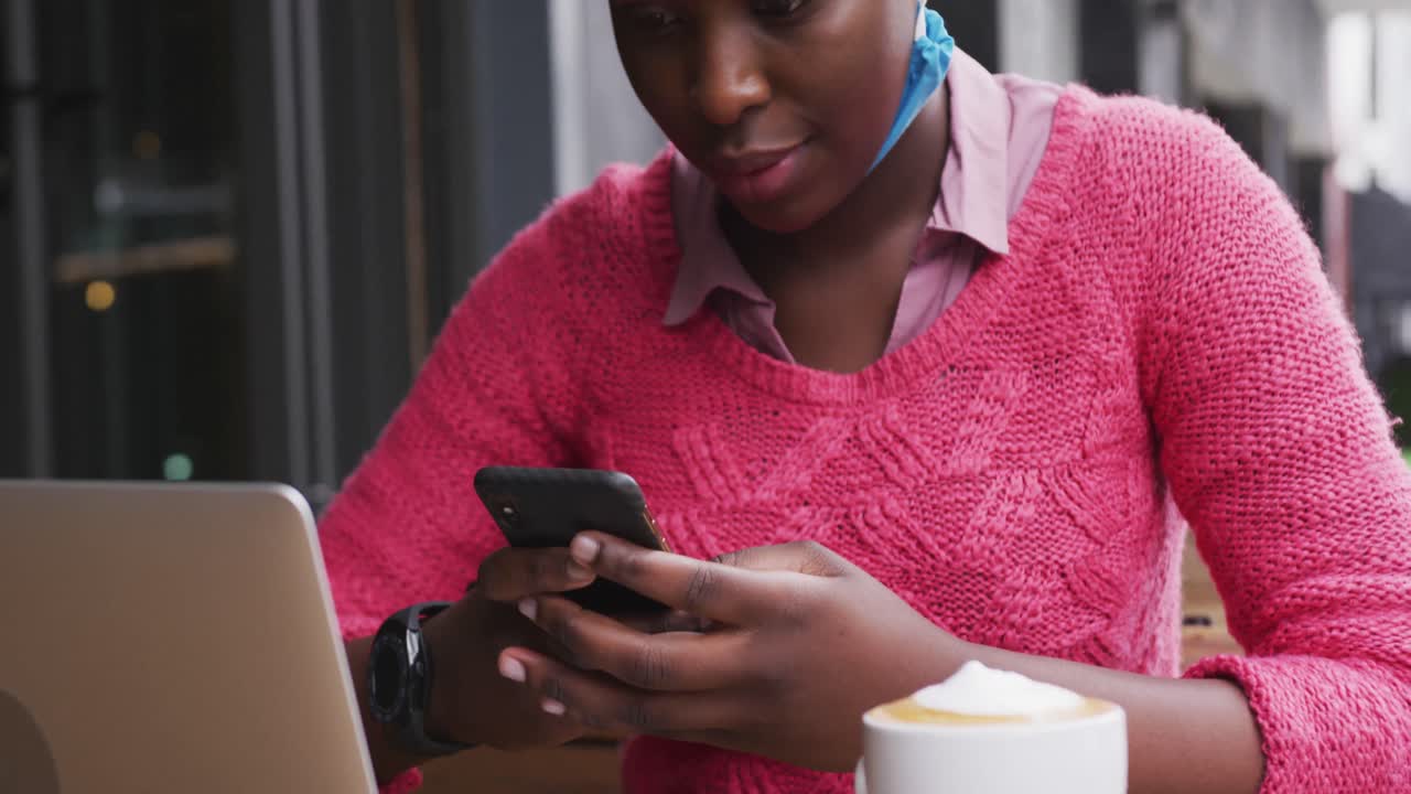 African american sitting in a cafe