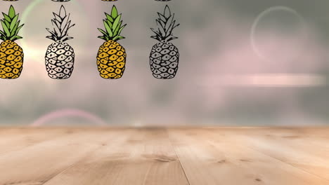 animación de piñas que se mueven sobre el suelo de madera contra el efecto bokeh y los puntos brillantes