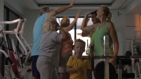 excited family in the gym