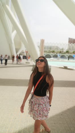 woman walking in a modern city park