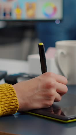 vertical video close up of photo editor freelancer editing customer photo