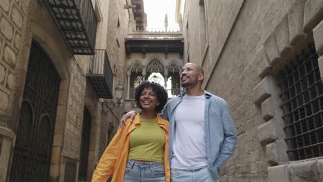 couple walking on a street in europe