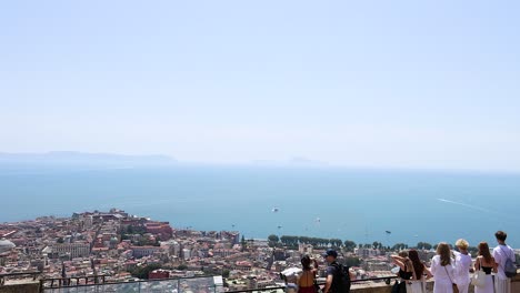 people enjoying panoramic view of naples, italy