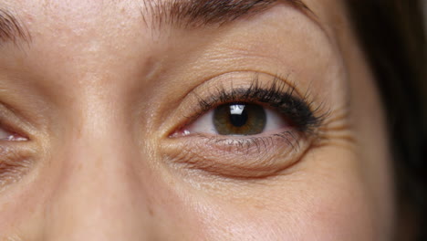 woman's eyes crinkle as she smiles