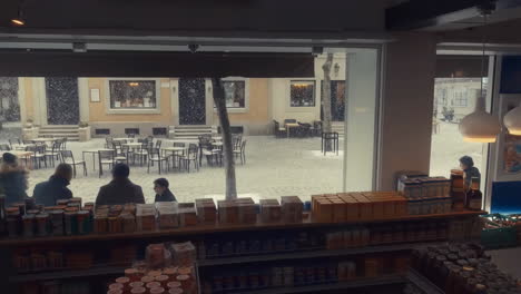 view from a cafe window on a snowy winter day