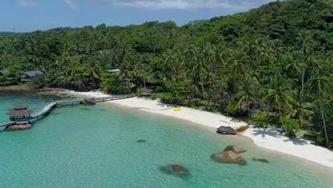 backwards-aerial-of-a-perfect-tropical-private-beach-in-Asia