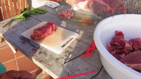 Man-Preparing-Meat-For-Espetada