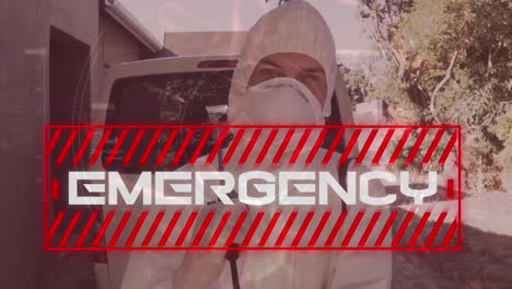 word emergency written over a man dressed in protective suit and face mask in background