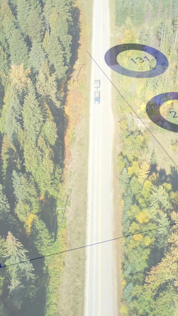Lava-auto liikkuu tien keskellä, aiheuttaen sinisiä peittokuvia, jotka kartoittavat numeerisia merkkejä, kun henkilö astuu ulos.