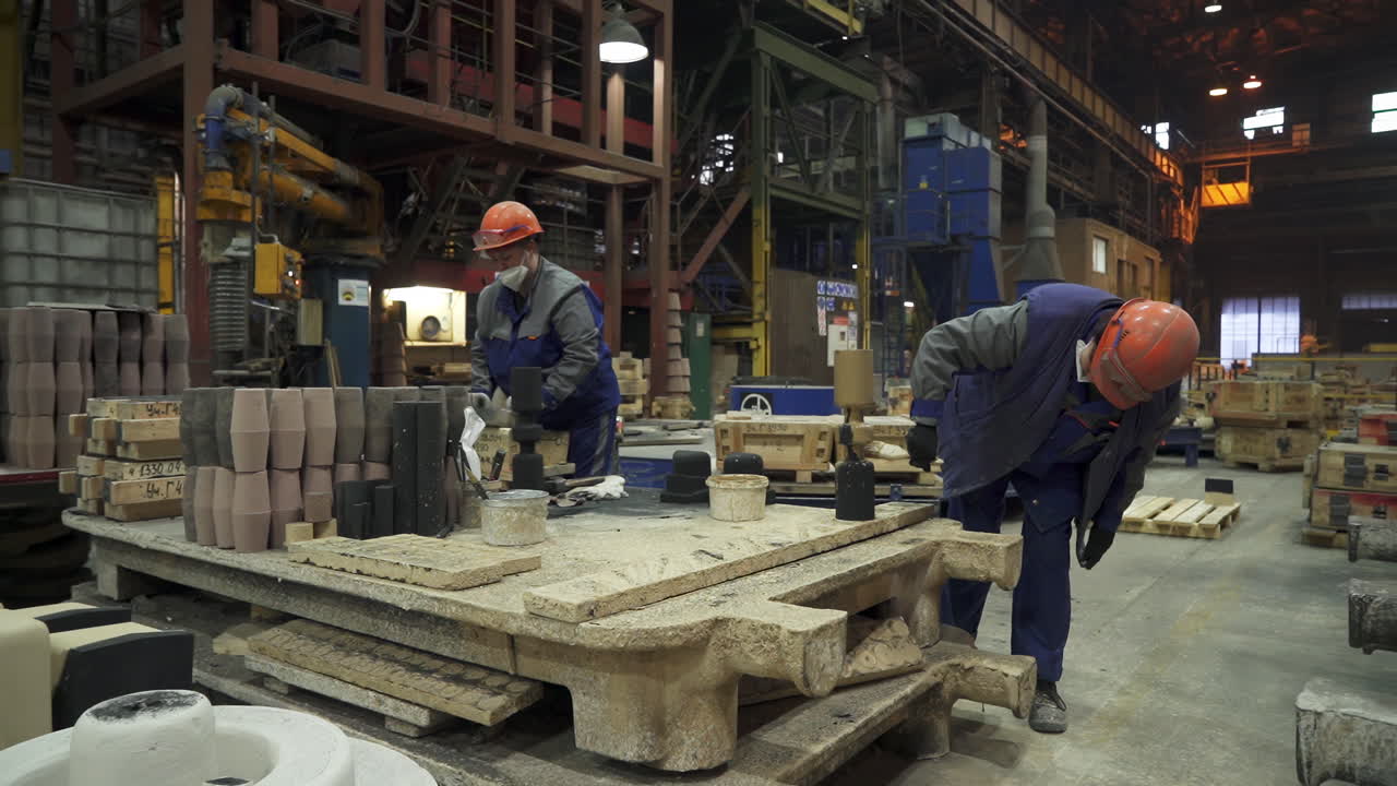 Factory Workers in a Foundry