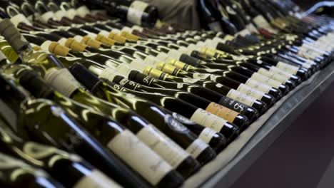 wine bottles displayed on a shelf