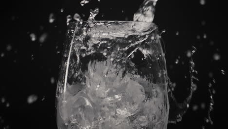 cold ice cubes drink glass closeup. fresh soda cocktail concept