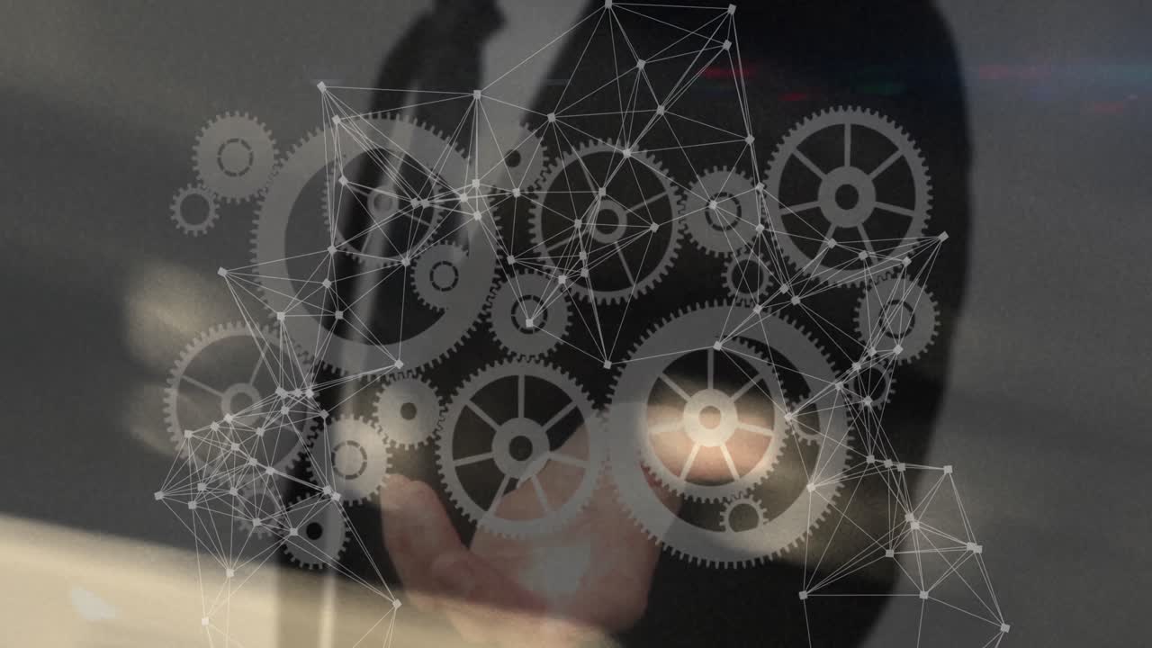 animación de la red de conexiones con engranajes sobre empresario caucásico