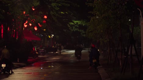 street night ambience after rain, motorbike drive away, other stop on the side of road