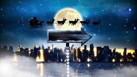 Santa-in-sleigh-with-reindeer-flying-and-arrow-sign-over-night-city-with-moon