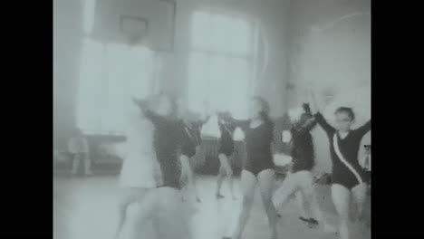 Group of Pioneers Dancing in Black and White. CIRCA USSR 1970: Group of Pioneers Dancing in Black and White
