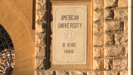 a sign identifies the american university of beirut in lebanon