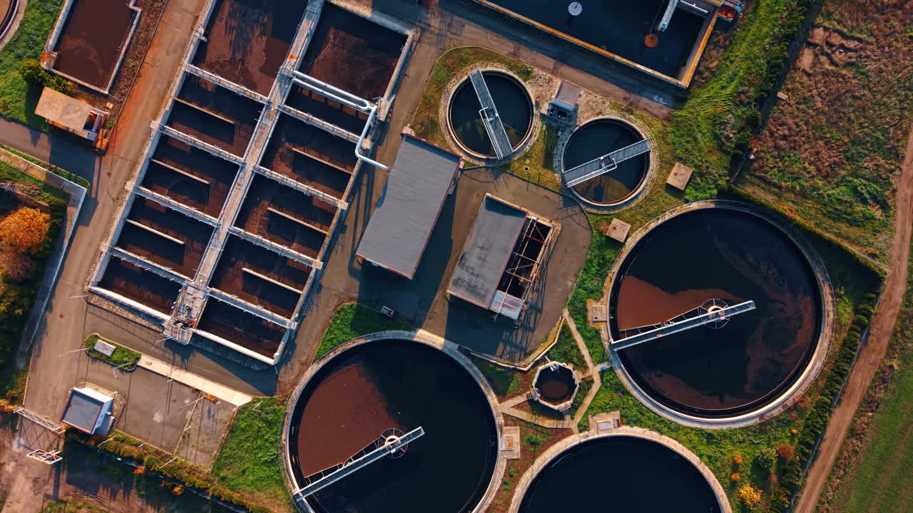 Circling over the modern waste water treatment plant. Environment friendly technology concept. Top view