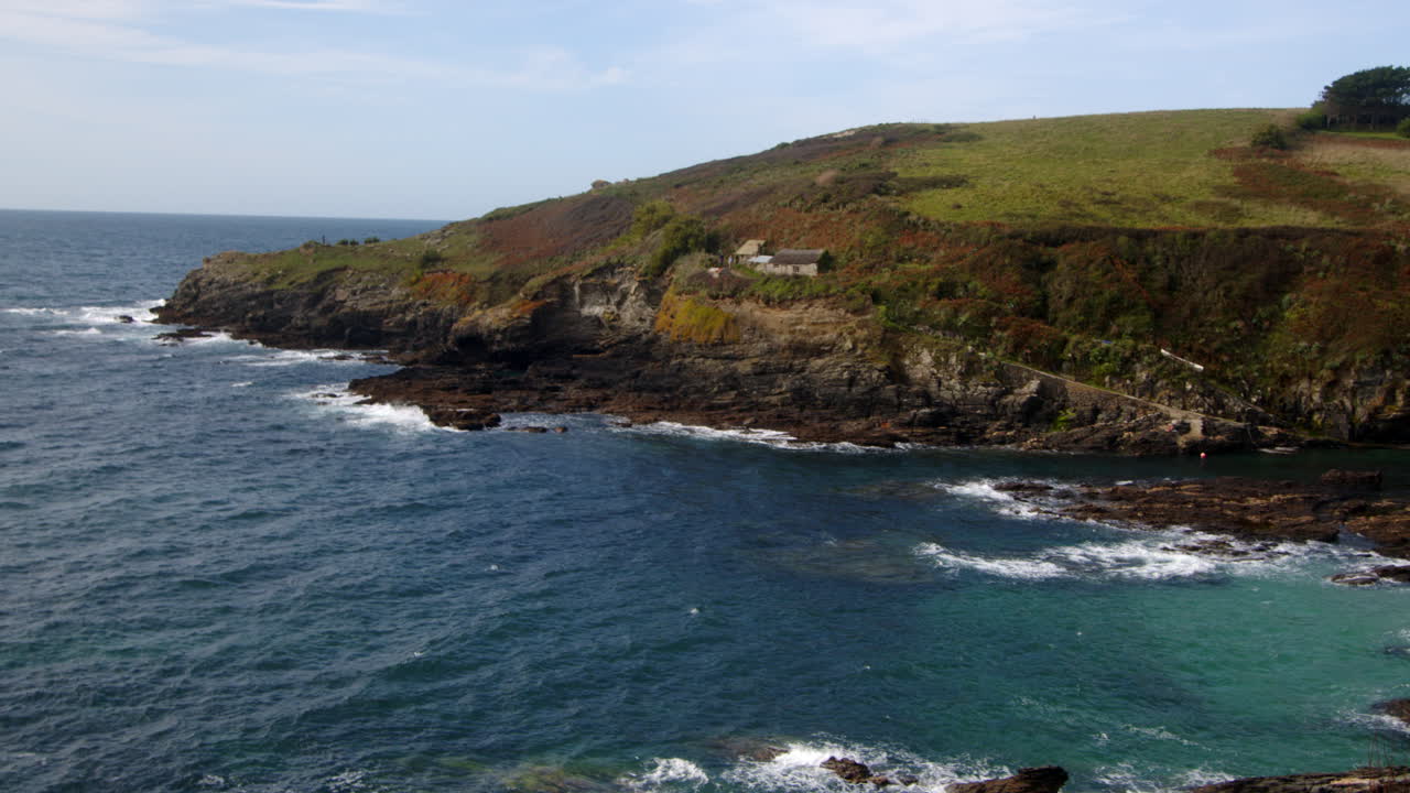 Wide shot looking west over Bessy's Cove, The Enys, cornwall
