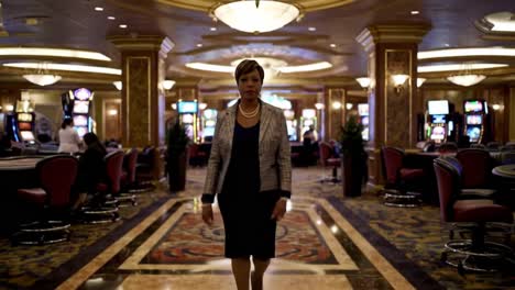 a confident woman strolling through an elegant casino, surrounded by dazzling slot machines and opulent decor, embodying luxury and glamour in a vibrant atmosphere