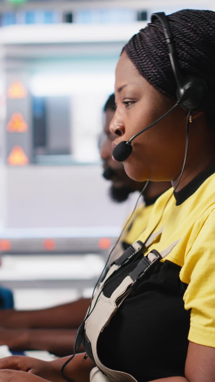 Vertical Video African American engineer offers service from solar panel call center