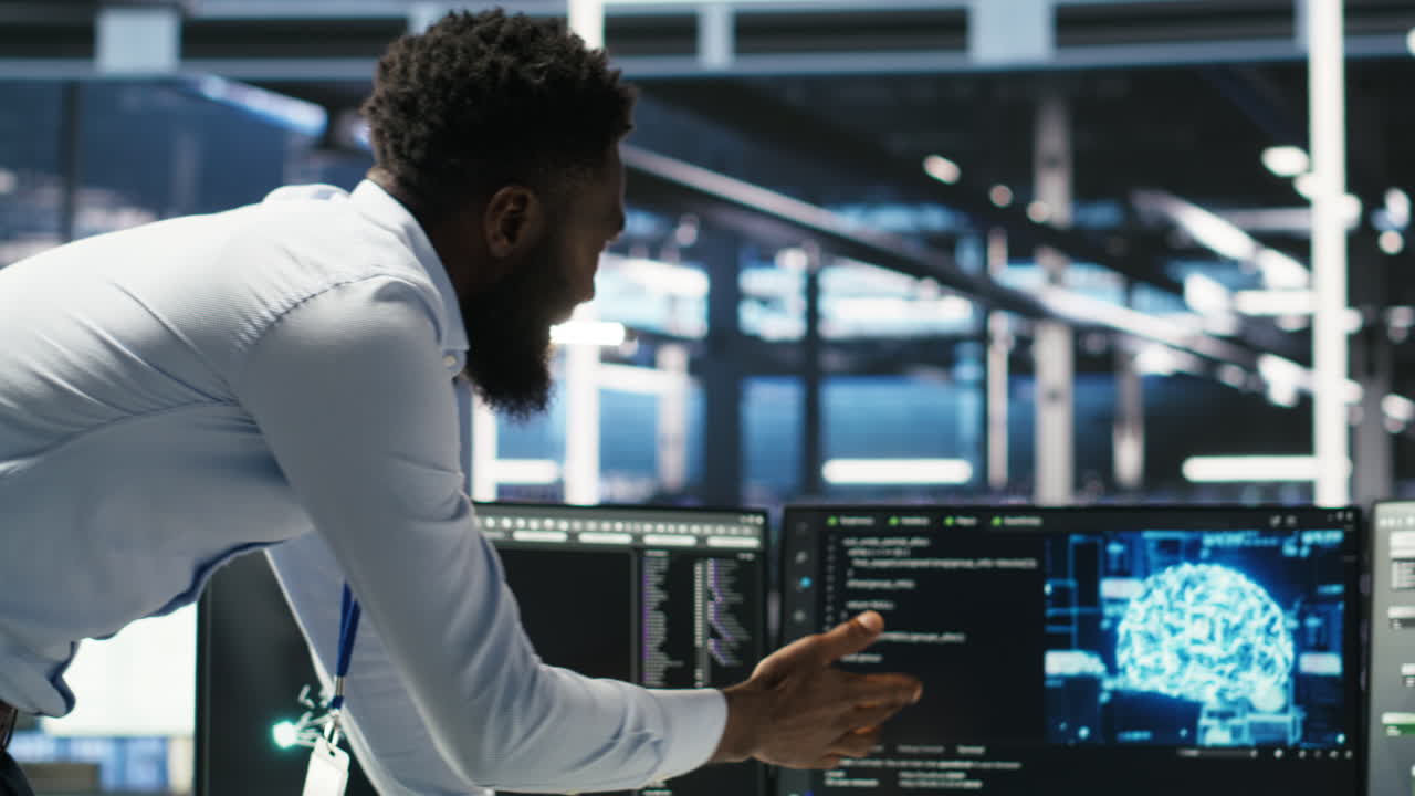 Server farm supervisor and man with disability oversee AI analytics