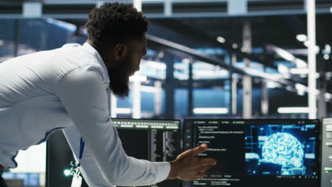 Server farm supervisor and man with disability oversee AI analytics