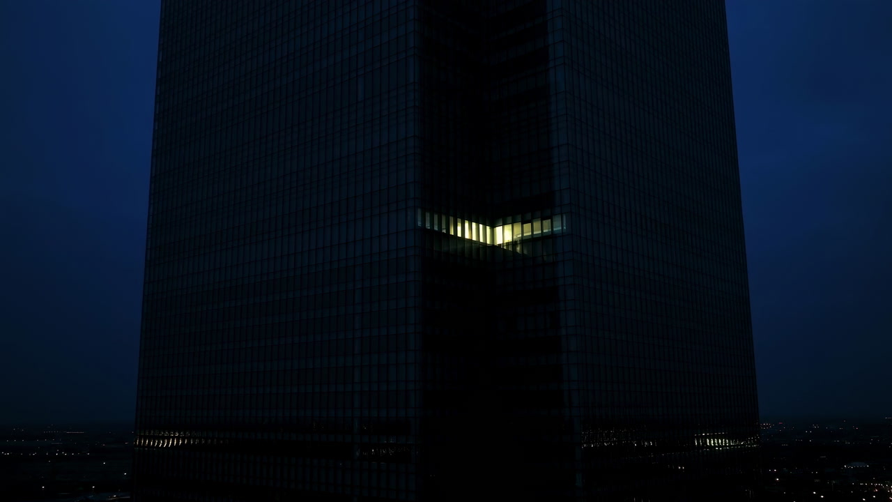 Night Skyscraper With Single Lit Window, Dark Glass Facade Looming Over Quiet City, Empty Offices Hinting