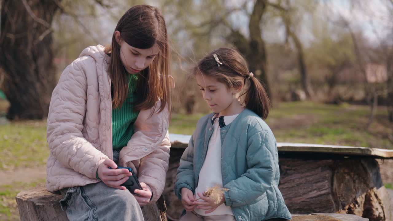 Two sisters in a park