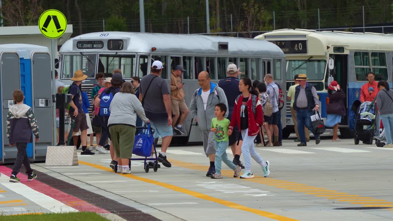 Vintage Bus Enthusiasts Gather at a Bus Event