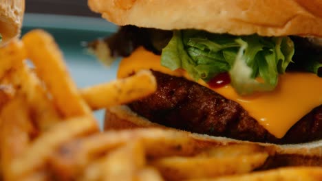 meat free cheese burger with brioche bun lettuce ketchup and chips