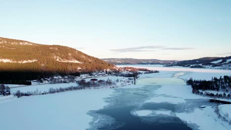 Church-by-the-frozen-Kroderfjord-in-Norway