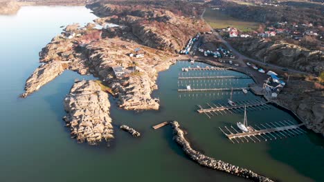 sweden island boat harbor on west coast, aerial establishing