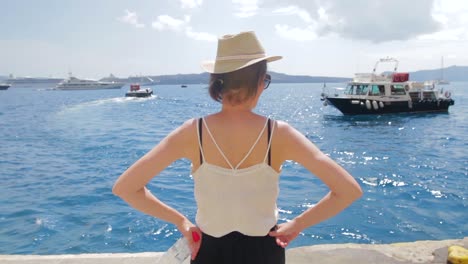 tourist overlooking bay in greece