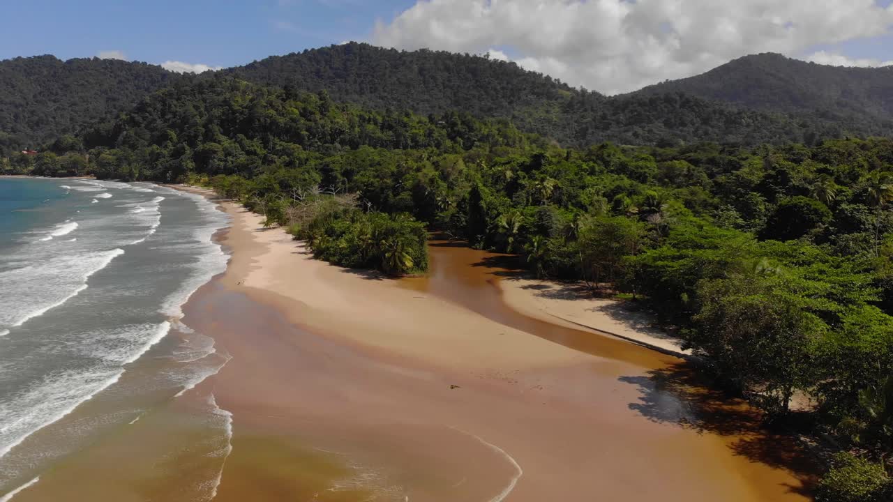 Mount El Tucuche , Trinidad second highest mountain with Las Cuevas Bay in the foreground on the north coast of this amazing Caribbean island