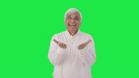 Happy-Indian-old-man-getting-a-big-surprise-Green-screen