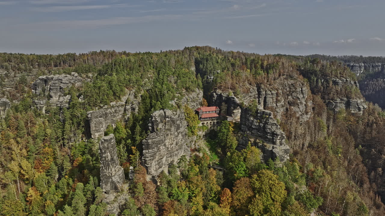 Hrensko Czechia Aerial v3 breathtaking view, flyover hillside Pravcicka Archway and Falcon's nest capturing spectacular rock formation in Bohemian Switzerland - Shot with Mavic 3 Cine - November 2022