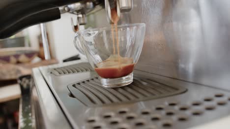 Happy-african-american-male-and-female-baristas-working-at-coffee-shop,-slow-motion