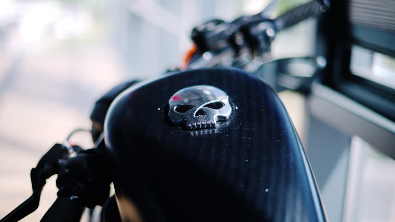 Chisinau, Moldova - June 20, 2024: A metal skull on the seat of a Harley Davidson motorcycle