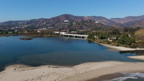 malibu lagoon after the franklin fire, entire mountain range scorched, pepperdine university visible