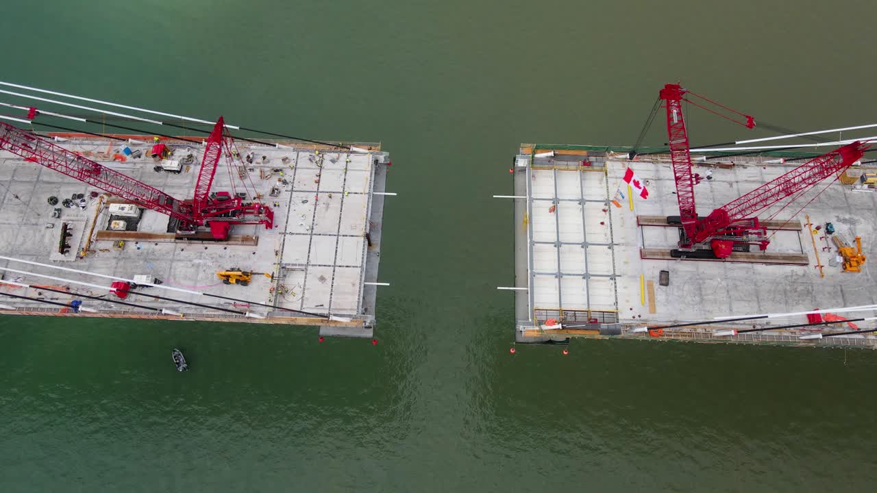 Aerial ascending view of Gordie Howe international bridge in final phase of construction